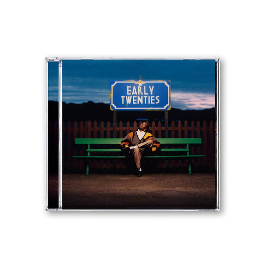 CD cover for Cat Burns’ “Early Twenties” featuring a person on a bench.