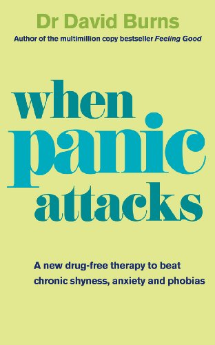 Book cover with teal text reading "when panic attacks" on a light green background.