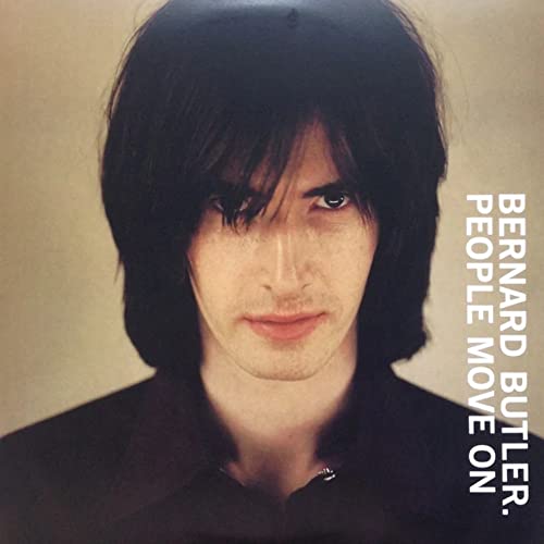 Portrait of Bernard Butler with album title "People Move On" text.