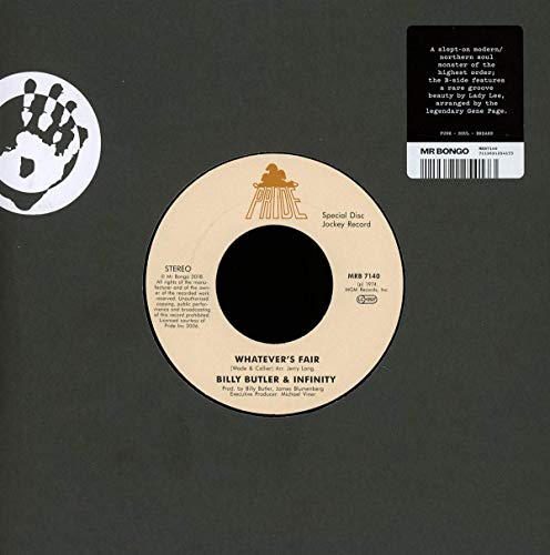 Vinyl record with beige label and black text on a dark gray background.