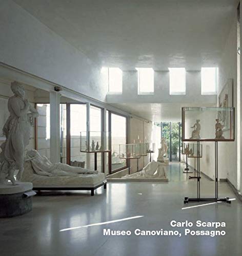Interior view of the Gipsoteca Canoviana featuring white marble statues in a minimalist gallery.