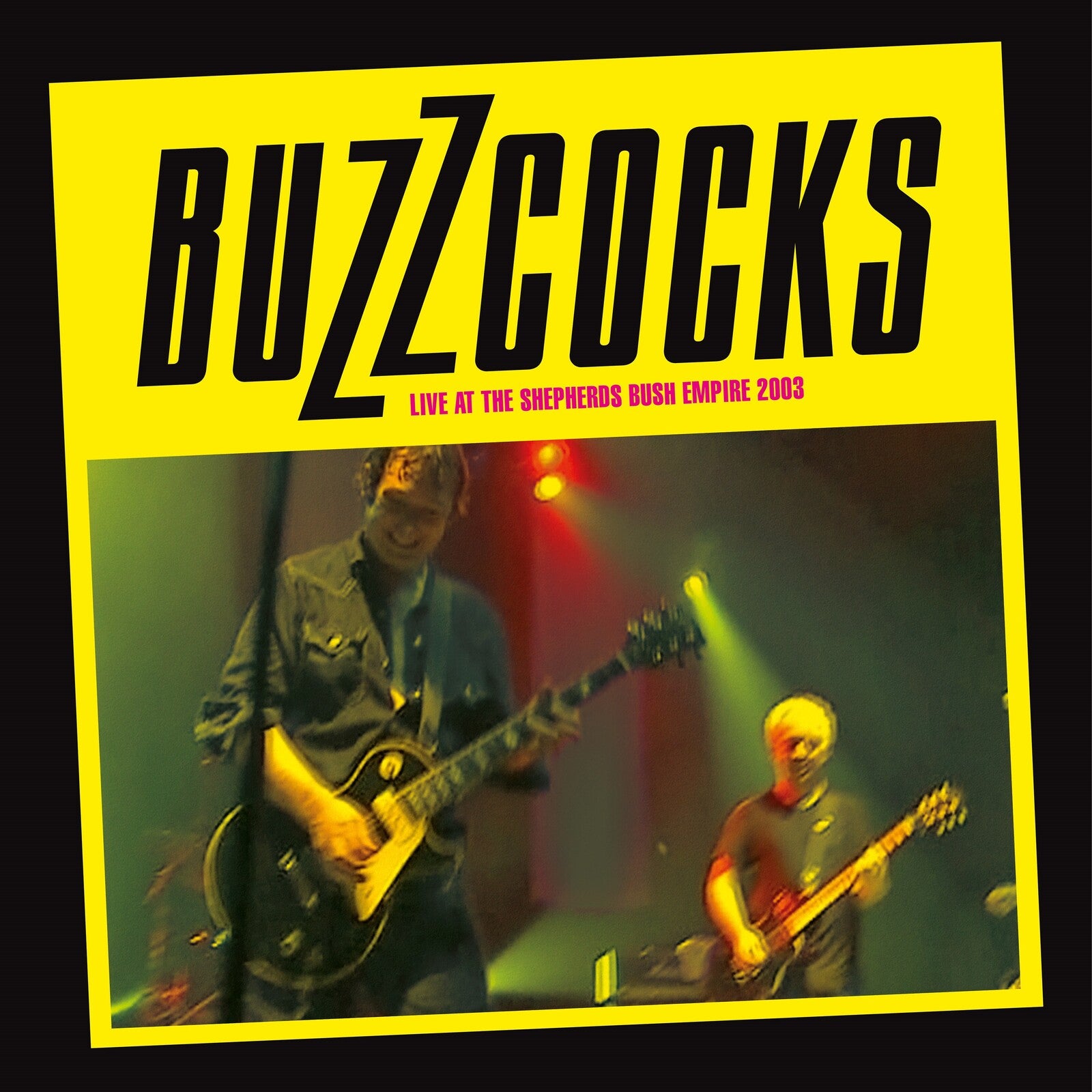Buzzcocks album cover: yellow background, band performing live on stage.