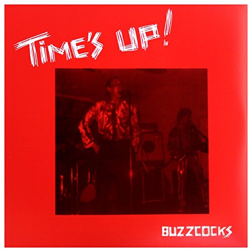 Red album cover for Buzzcocks’ “Time’s Up” featuring band members onstage.