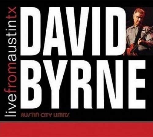 David Byrne vinyl album cover featuring a man singing into a microphone with a guitar.