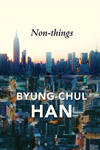 Book cover with a city skyline and an inverted aerial view of a city.