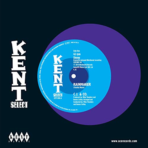 A vinyl record with a blue and purple label on a black background.