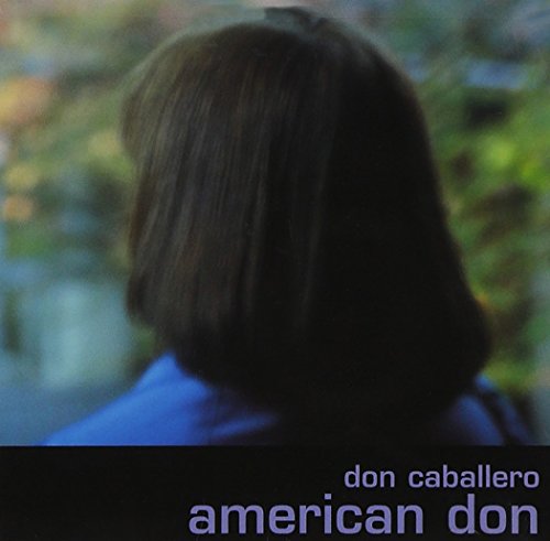 CD cover: back of a person with short hair, green background.