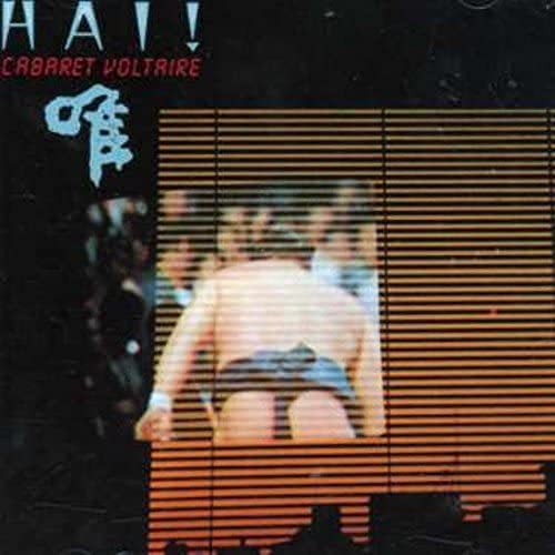 CD cover for Cabaret Voltaire’s “Hai!” with a figure seen through blinds.