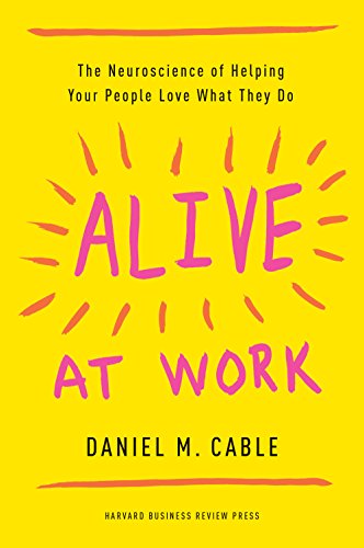 Yellow book cover with pink handwritten-style title "Alive at Work".