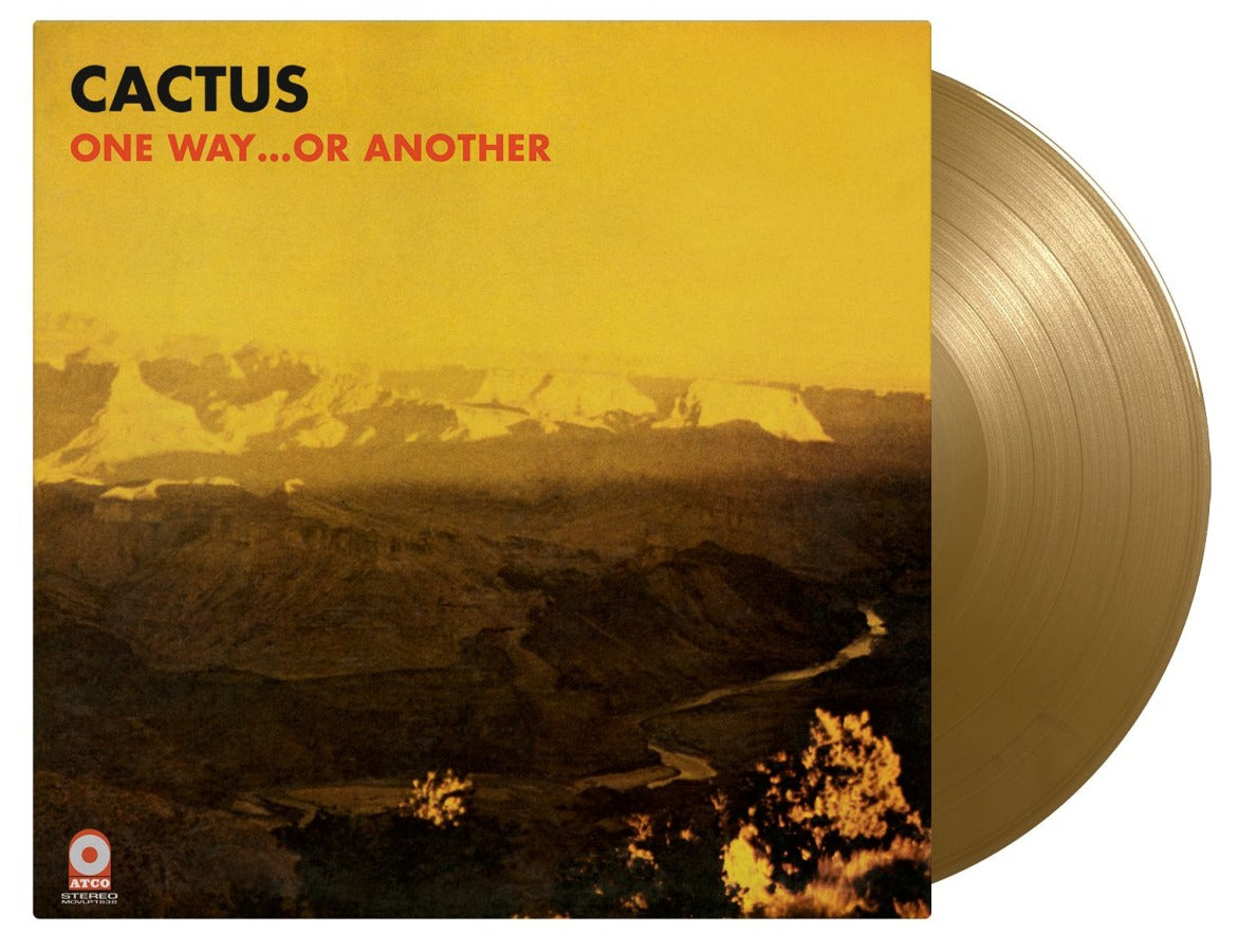 Cactus album cover with desert landscape and vinyl record beside it.