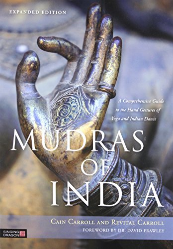 Book cover featuring a bronze hand in a mudra gesture.