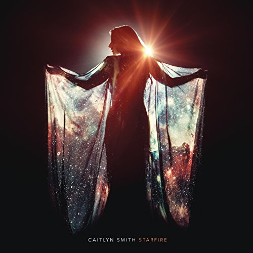 CD cover for Caitlyn Smith’s “Starfire” featuring a silhouetted figure with galactic imagery.