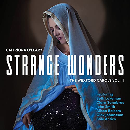CD cover: woman in blue veil, album title "Strange Wonders.