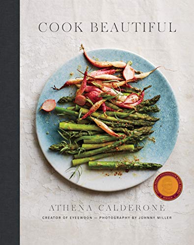 Cookbook cover with arranged vegetables on a blue plate, title "Cook Beautiful".