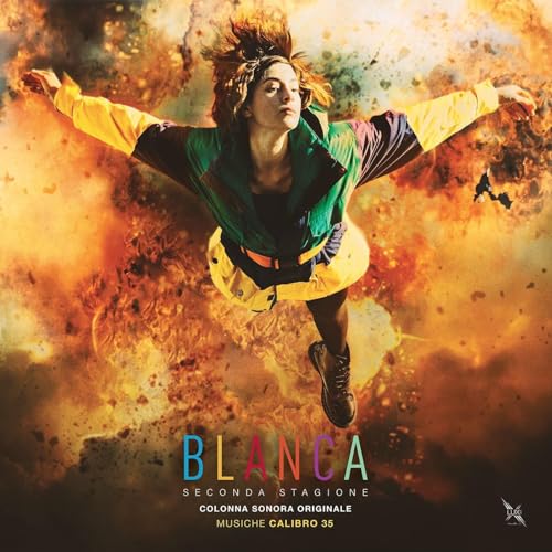 Vinyl album cover featuring a person mid-air against a fiery, colorful background.