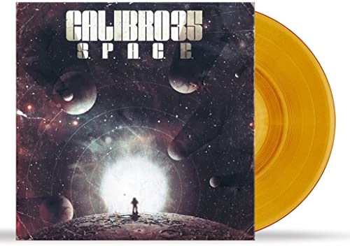 Vinyl record with space-themed cover art and a bright orange disc.