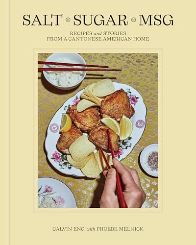 Cookbook cover featuring fried chicken, potato chips, and chopsticks on a floral plate.