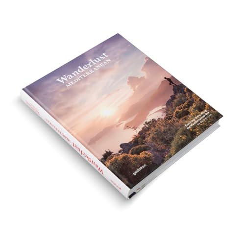 Hardcover book titled Wanderlust Mediterranean featuring a sunset coastal landscape with a hiker.