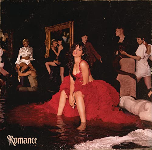 Camila Cabello in red dress surrounded by figures in a dark room.