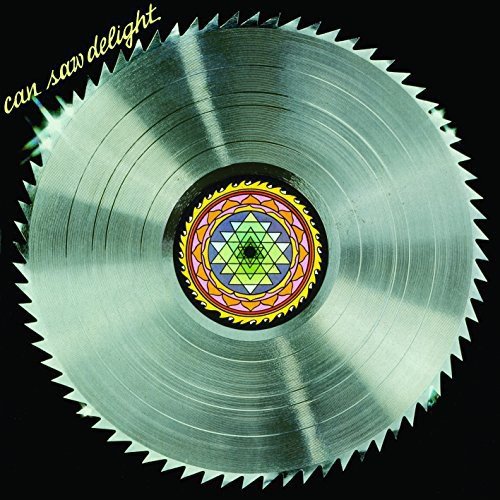 A circular saw blade with a colorful mandala pattern in the center on black.