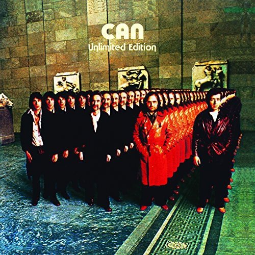 Album cover showing multiple identical rows of band members standing in a stone hall.