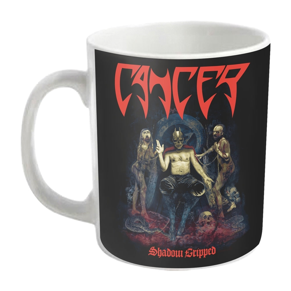 White mug with dark artwork of a demonic figure and figures surrounding it.