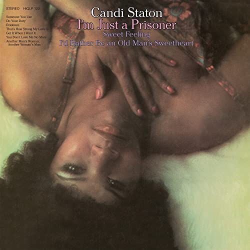 Candi Staton's "I'm Just A Prisoner" vinyl record cover with a reclining figure.