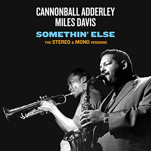 Album cover with black background, two musicians playing trumpet and saxophone.