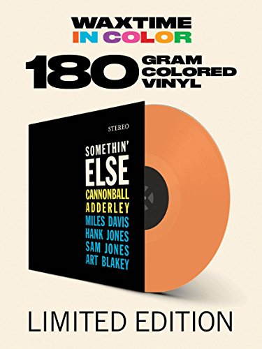Black album cover with white and blue text listing jazz musicians’ names.
