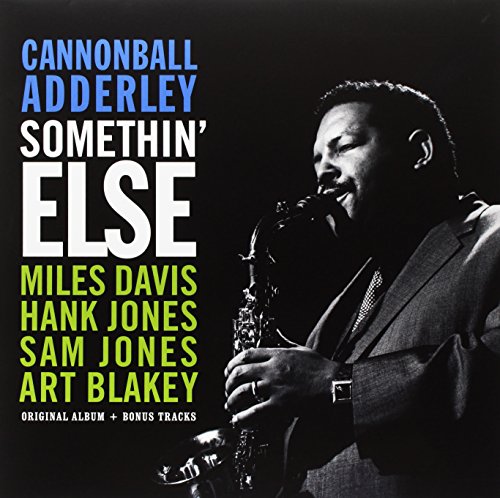 Black and white vinyl album cover with a man playing the saxophone.