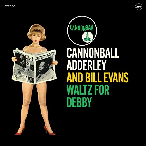 Vinyl album cover featuring a woman reading a newspaper with a black background.