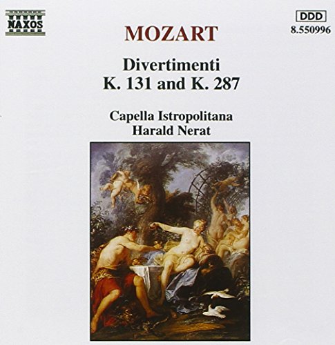 "CD cover with 'Mozart' in red and a classical painting of nude figures."
