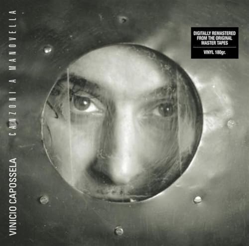 Vinyl album cover: face peering through a circular opening.
