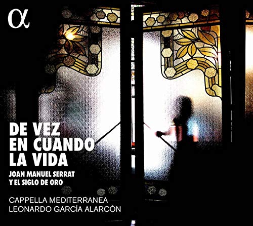 CD cover with stained glass window and silhouette figure.