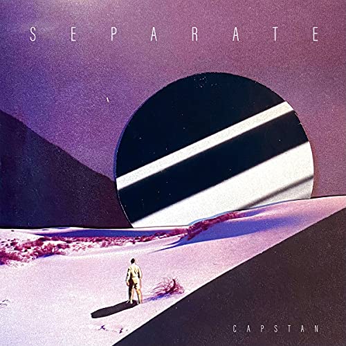 CD cover: desert landscape with a figure standing under a dark circle.
