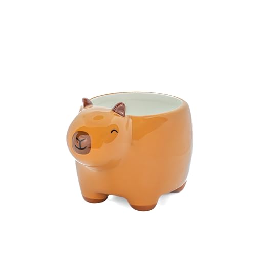 Orange ceramic capybara shaped planter with a smooth, glossy finish.