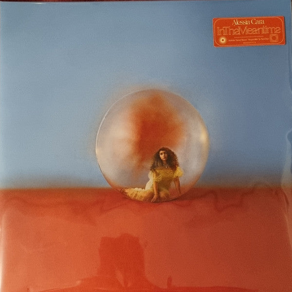 Vinyl record cover featuring a woman inside a large, glowing orb.