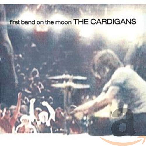 CD cover for The Cardigans’ “First Band on the Moon,” blurry concert scene.