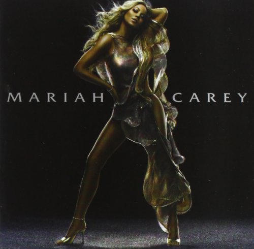 Mariah Carey album cover, featuring her in a shimmering gold dress.