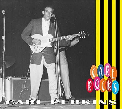 Carl Perkins playing guitar on stage, album cover with colorful text.