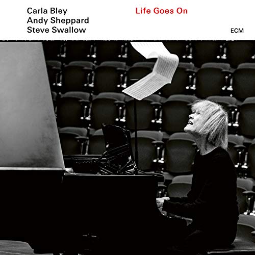 CD cover: Carla Bley, Andy Sheppard, Steve Swallow, piano, and empty seats.