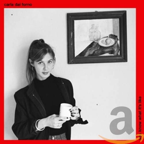 Black and white album cover featuring a woman holding a mug.