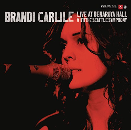 Brandi Carlile singing into a microphone, red and black album cover.