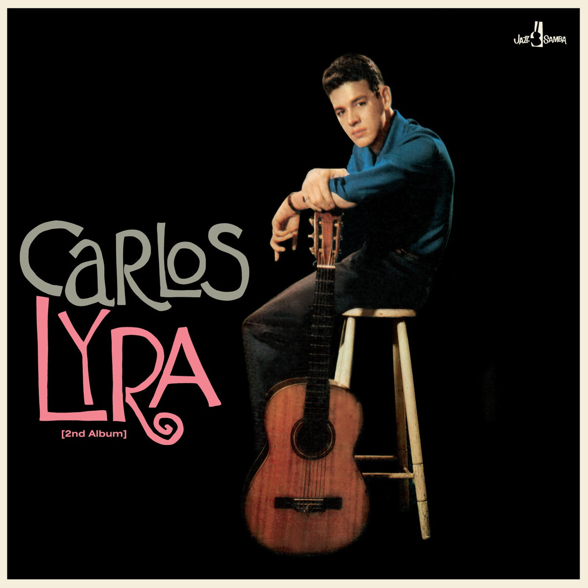 Carlos Lyra’s second album cover featuring him with a guitar.