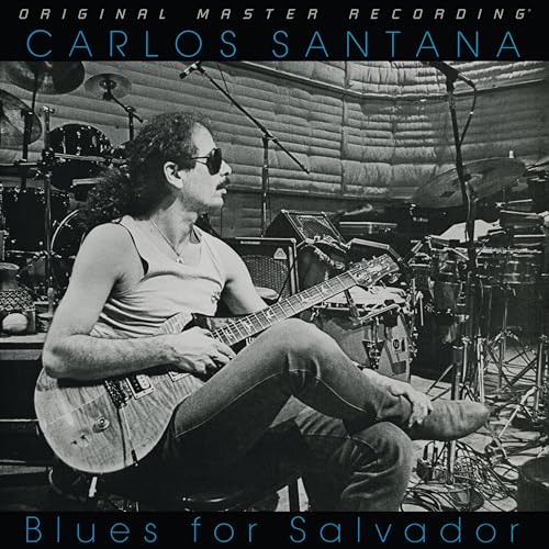 Carlos Santana playing guitar on the album cover, "Blues For Salvador.