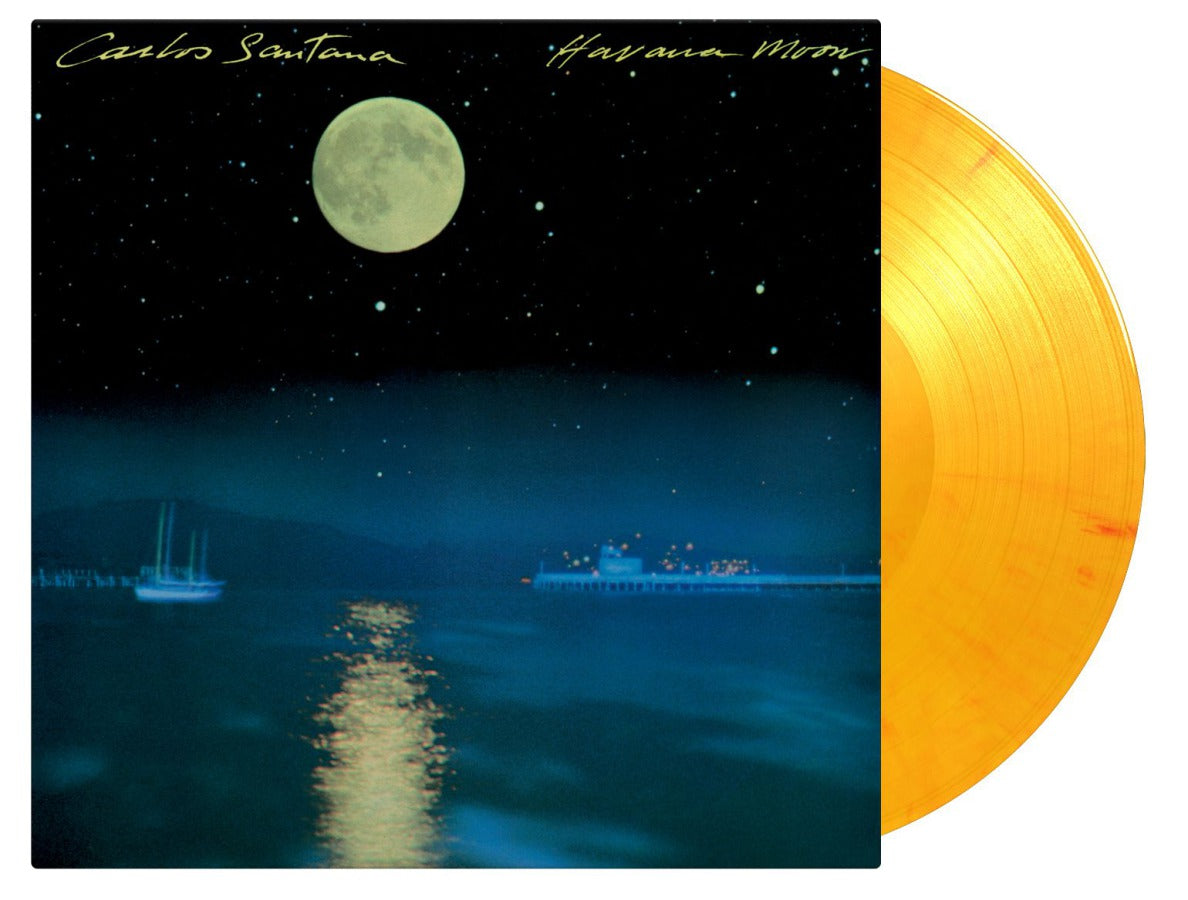 Carlos Santana’s “Havana Moon” vinyl record with a moonlit seascape cover.