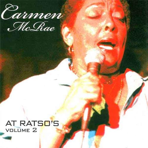 Carmen McRae singing into a microphone on CD cover.