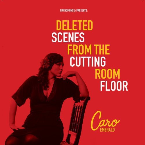 Red vinyl record with cover featuring a woman in black dress on red background.
