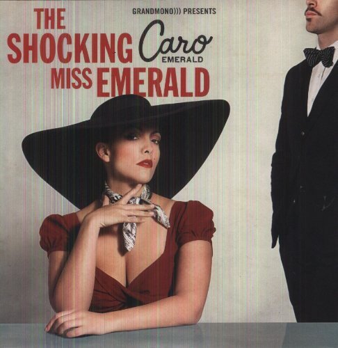 Album cover featuring a woman in red dress and large black hat.