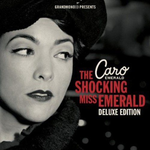 Black and white portrait of Caro Emerald wearing a beret, album cover.